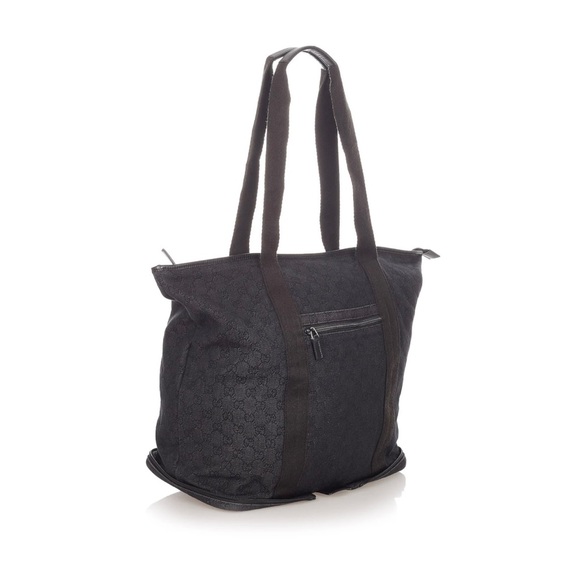 Gucci canvas convertible tote bag.